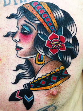 chest tattoo of gypsy